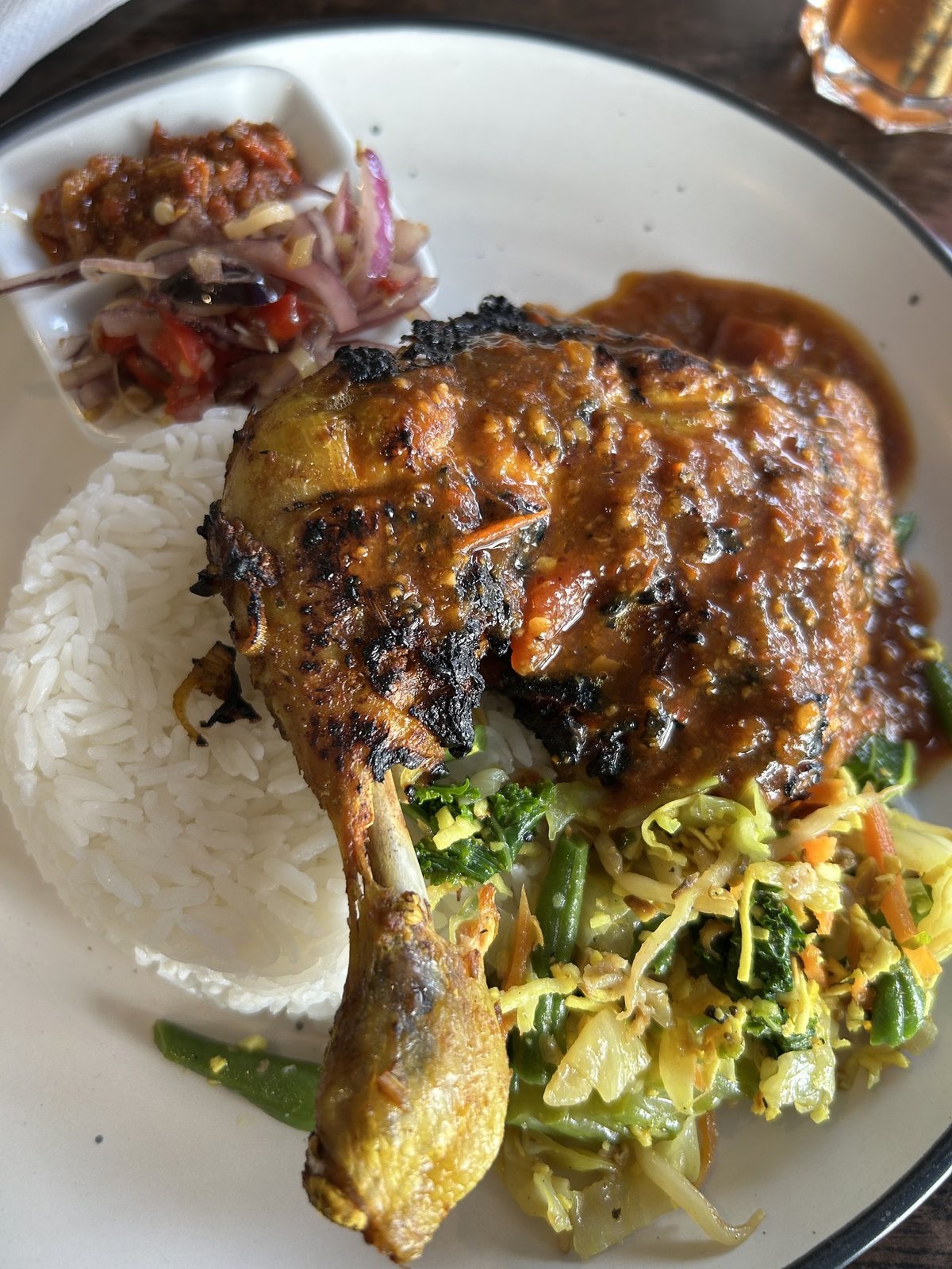 Grilled chicken with rice, vegetables and sambal